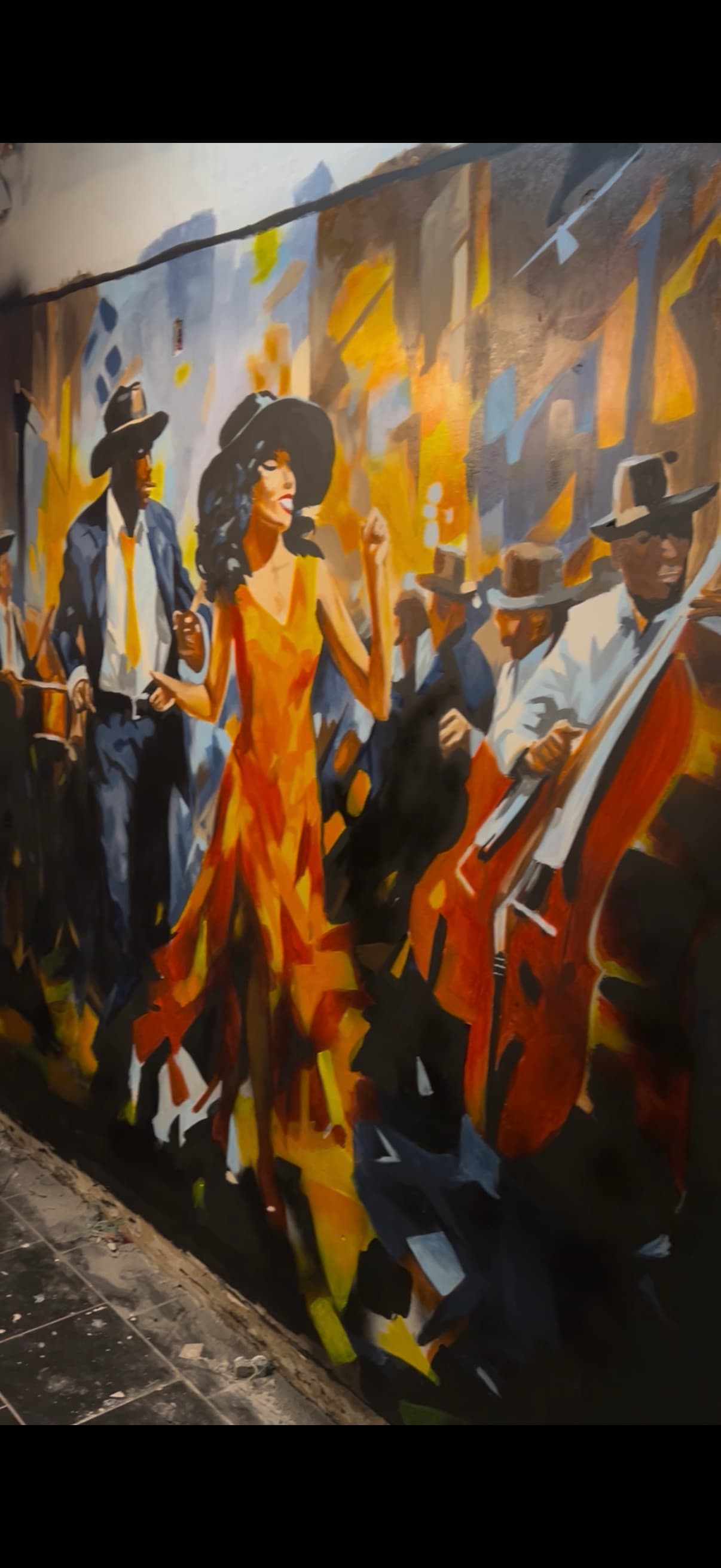 Hand-painted realism mural of dancers and musicians by Marley of Natural Art Studios, Charlotte NC